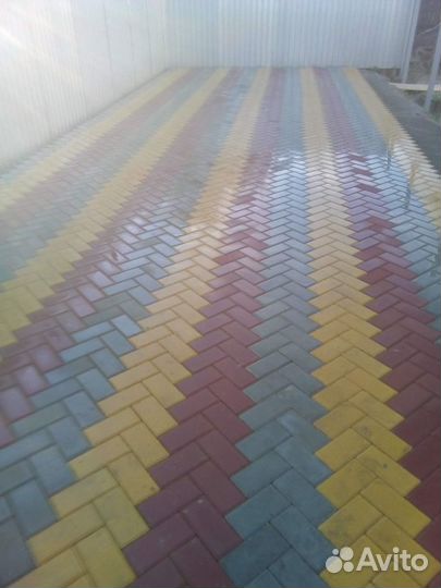 Укладка тротуарной плитки брусчатки
