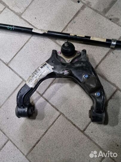 Рычаг подвески Mitsubishi Pajero Sports