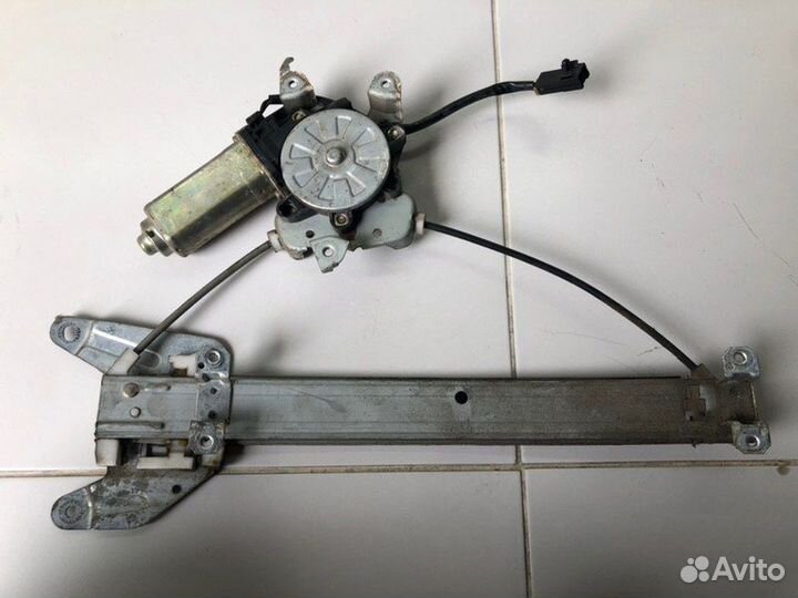 Стеклоподъемник электрический задний левый Nissan