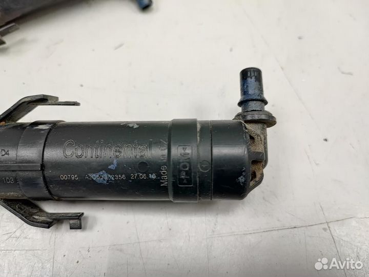 Форсунка омывателя фар левая правая VW touran cadd