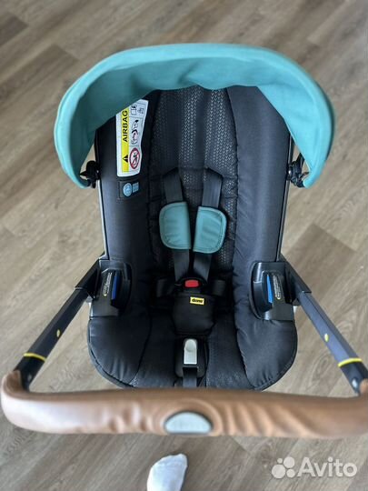 Коляска автокресло doona plus с базой isofix