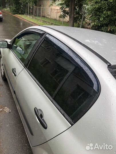 Ветровики рено меган 2