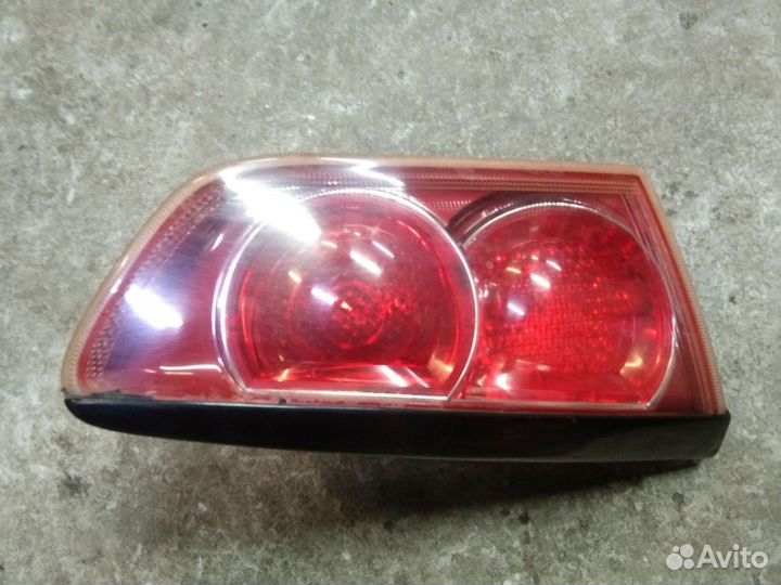 Фонарь задний левый Митсубиси Лансер 10