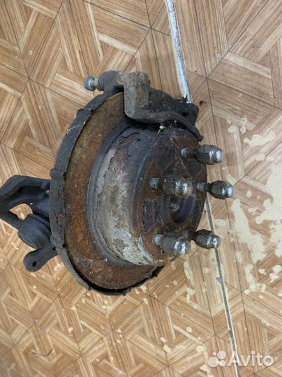 Кулак задний левый Kia Sportage 3