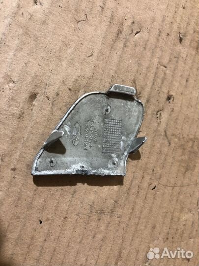 Заглушка буксировочного крюка переднего бампера