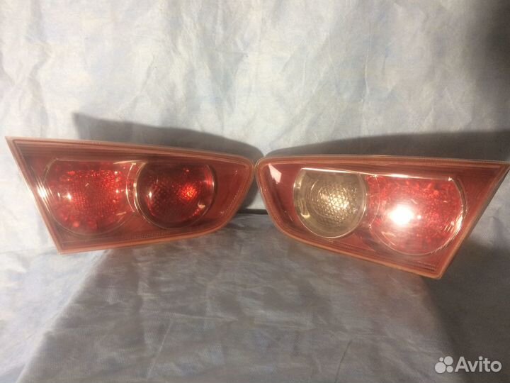 Фонарь задний левый правый на лансер 10