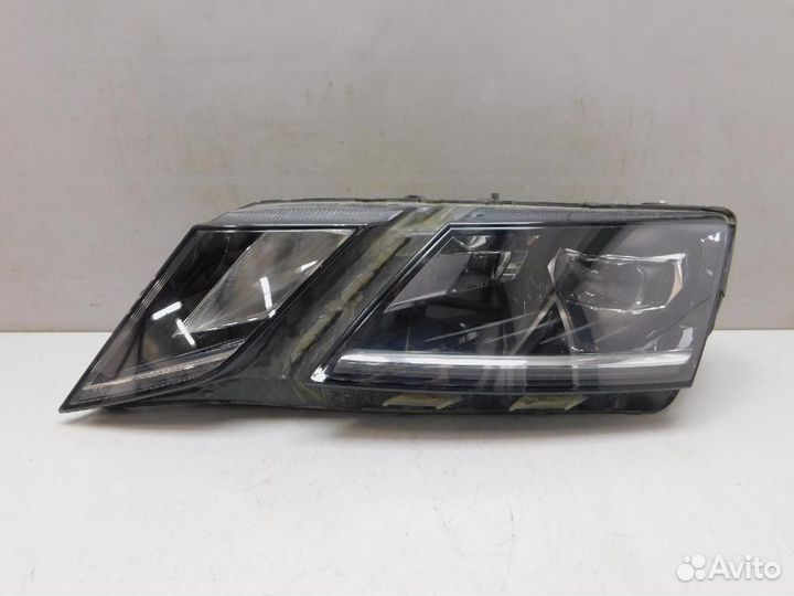 Фара левая Skoda Octavia