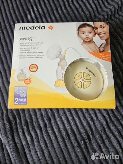 Молокоотсос medela электрический