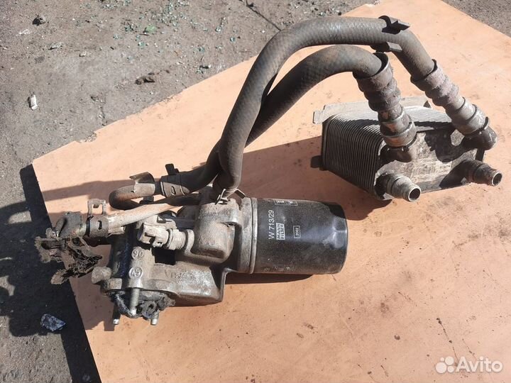 Кронштейн масляного фильтра 96JV6L635AB