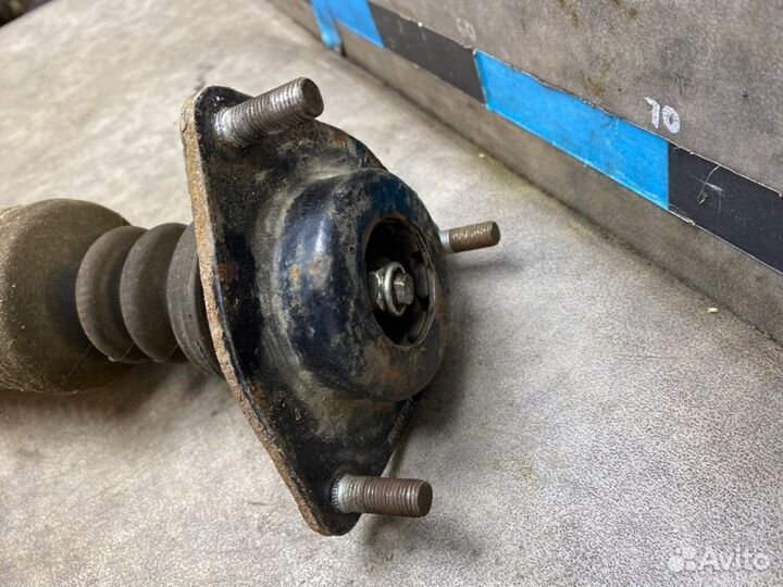 Амортизатор передний левый Mitsubishi Lancer 10