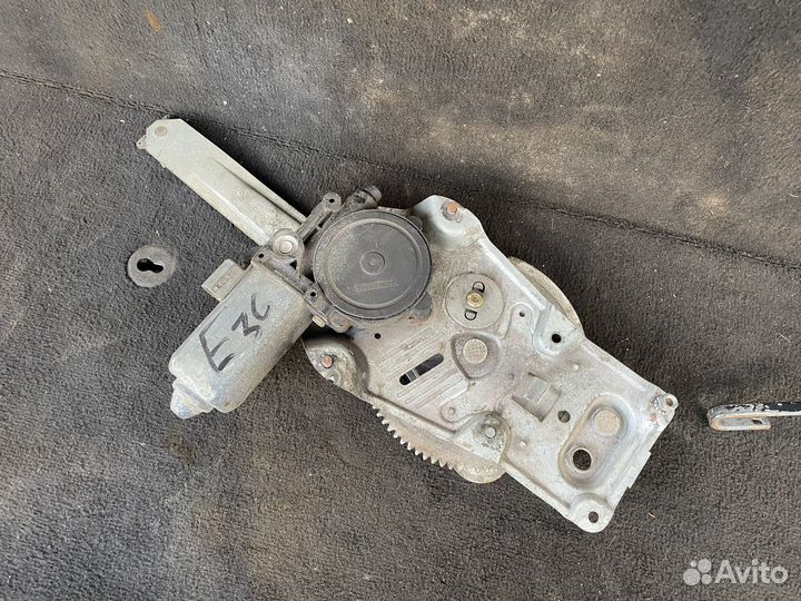 Стеклоподъемник задний левый BMW E36