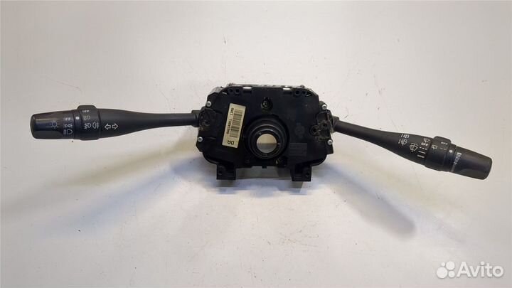 Переключатель поворотов и дворников Nissan Primera