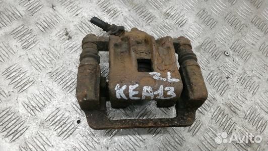 Суппорт тормозной задний левый KIA magentis MG (KE