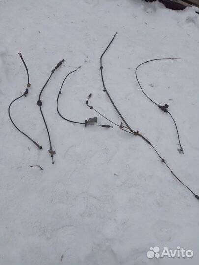 Трос Мазда Демио 1