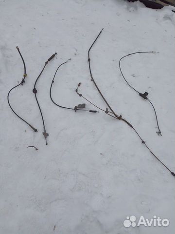 Трос Мазда Демио 1