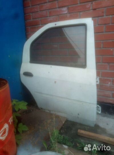 Дверь задняя правая renault logan 1