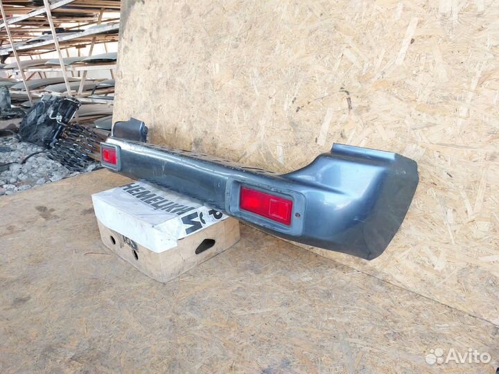 Бампер задний Mitsubishi Pajero Sport 1 до рест