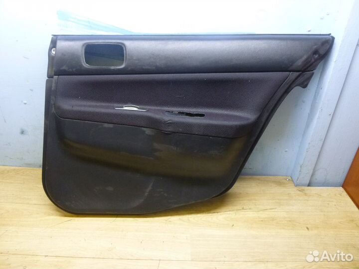 Обшивка двери задней правой Mitsubishi Lancer 9