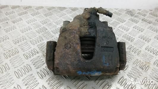 Суппорт тормозной передний левый mazda 3 2 (LBN06K