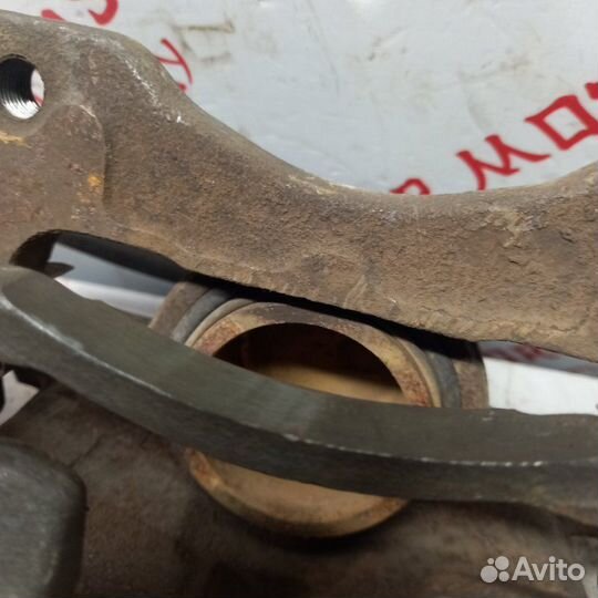 Суппорт тормозной передний Mitsubishi Outlander