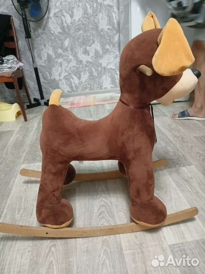 Собака качалка