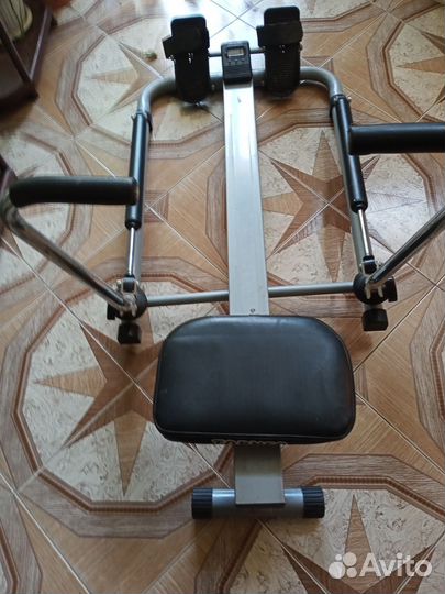 Гребной тренажер torneo