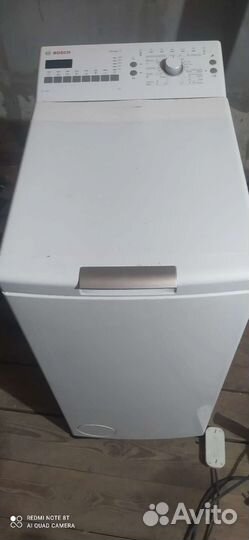 Стиральная машина с вертикальной загрузкой