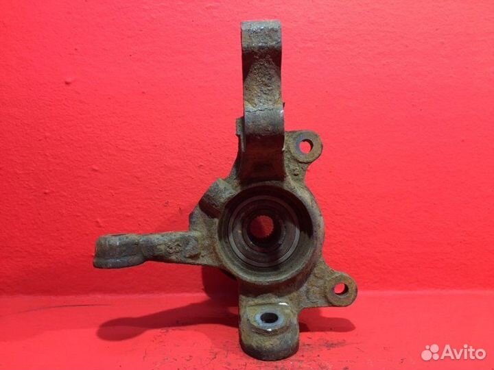 Кулак передний левый Toyota Celica T230 1zzfe 2004