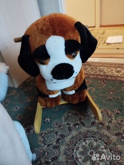 Собака качалка