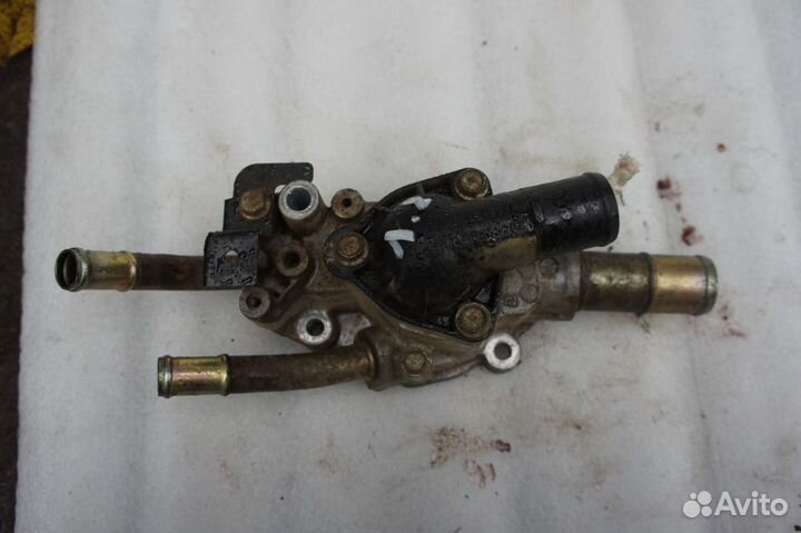 Nissan almera N16 корпус термостата