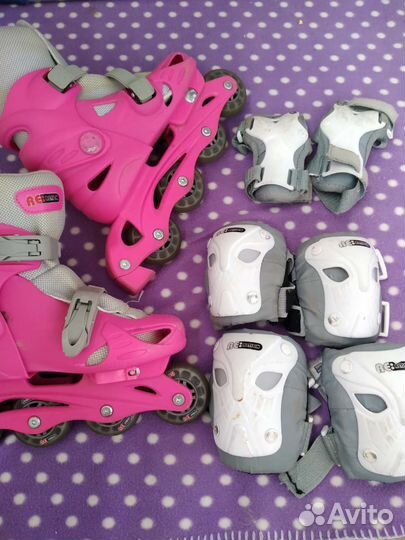 Роликовые коньки