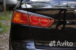 Реснички накладки спойлера Lancer X