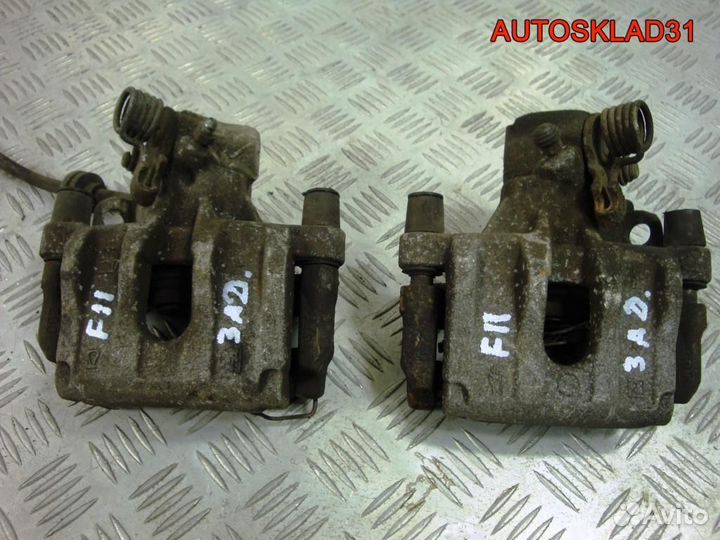 Суппорт тормозной задний Ford Focus 2 1365653