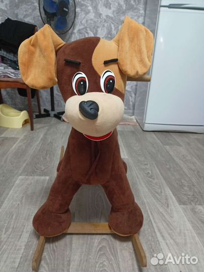 Собака качалка