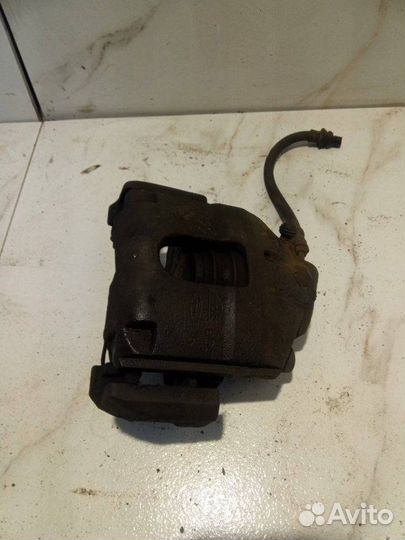 Суппорт тормозной передний правый Ford Fusion CBK