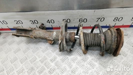 Стойка передняя левая toyota corolla E12 (JDN35K50