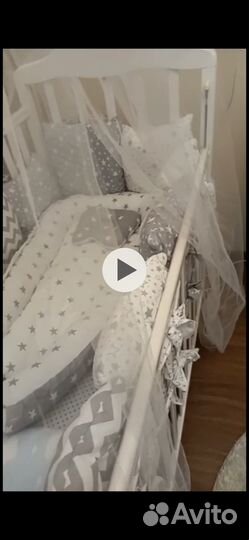 Детская кроватка с продольным маятником