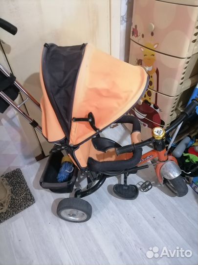 Трехколесный велосипед с ручкой