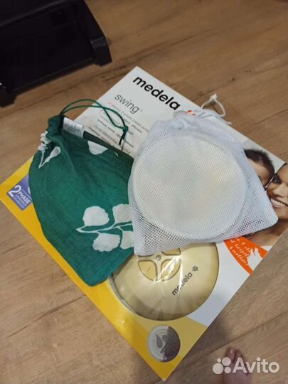 Молокоотсос medela электрический