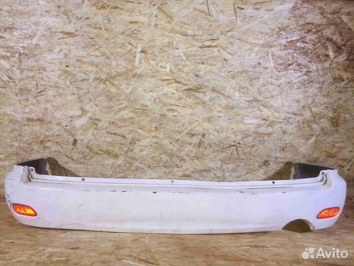 Бампер задний Дорест Nissan Wingroad Y11 Белыйдефе