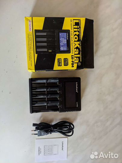 Зарядка для батареек новая