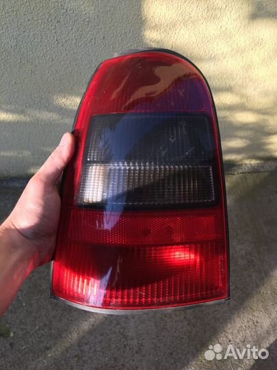 Левый фонарь Opel Vectra B универсал