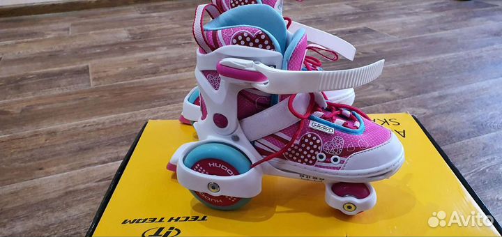 Роликовые коньки