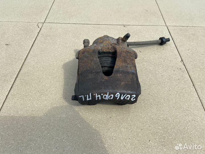 Тормозной суппорт перед лев Volkswagen Golf 4