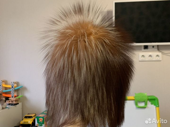 Женские меховые шапки