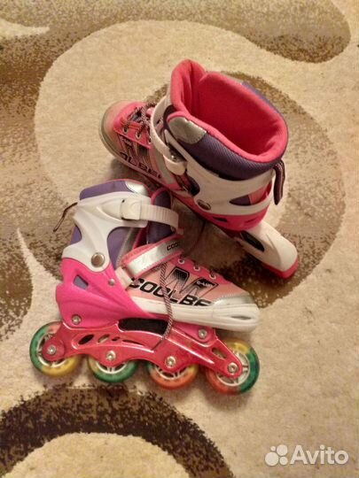 Роликовые коньки