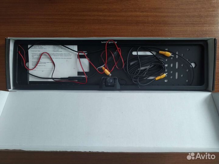 Видеокамера в рамке номерного знака