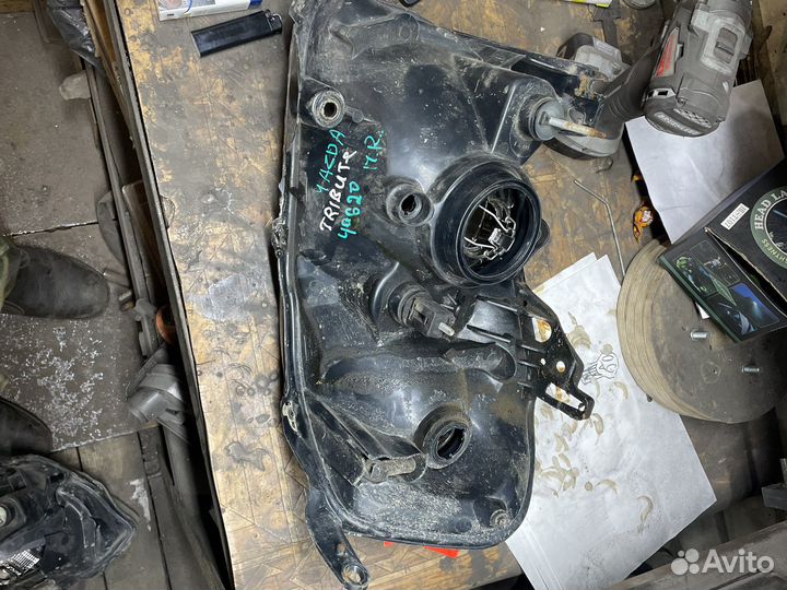 Фара правая мазда трибьют