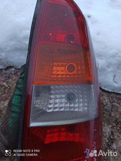 Opel Astra G (универсал) фонарь правый оригинал