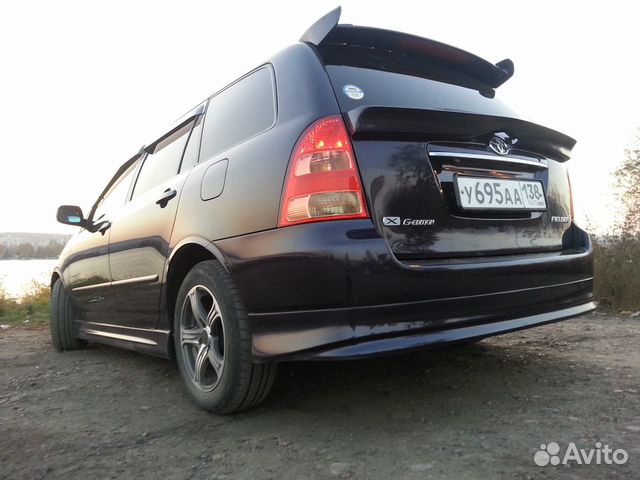 Toyota Fielder Накладки на спойлер (уши) c-one